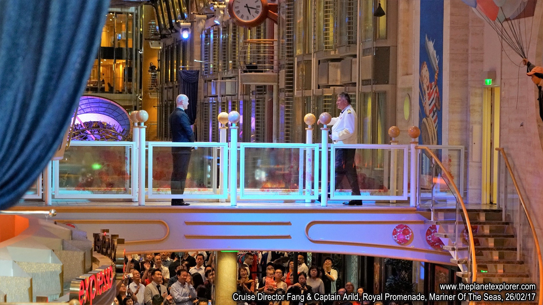 2017-02-26_1717_Mariner Of The Seas_Royal Promenade_Cruise Director Fang+Captain Arild_DSC07165_s7R2_LR_@www